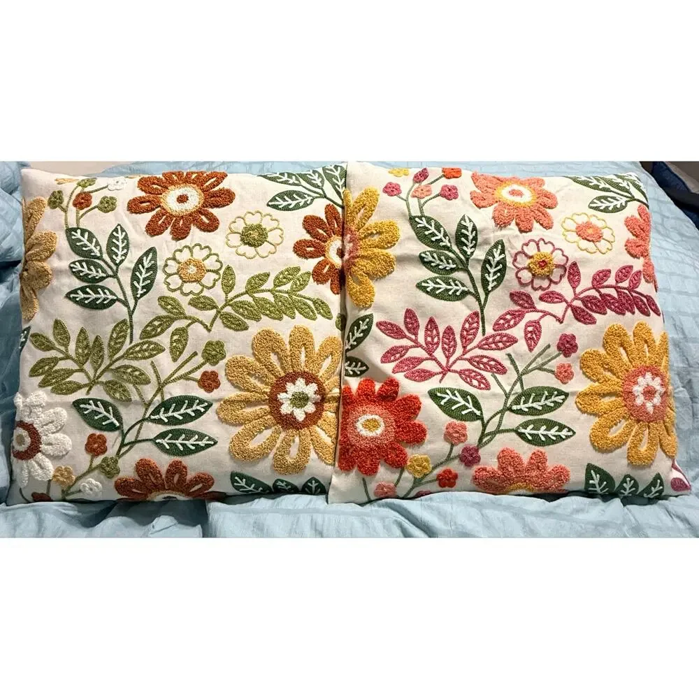 Two new decorative throw pillows Textured punch-needle style floral embroidery